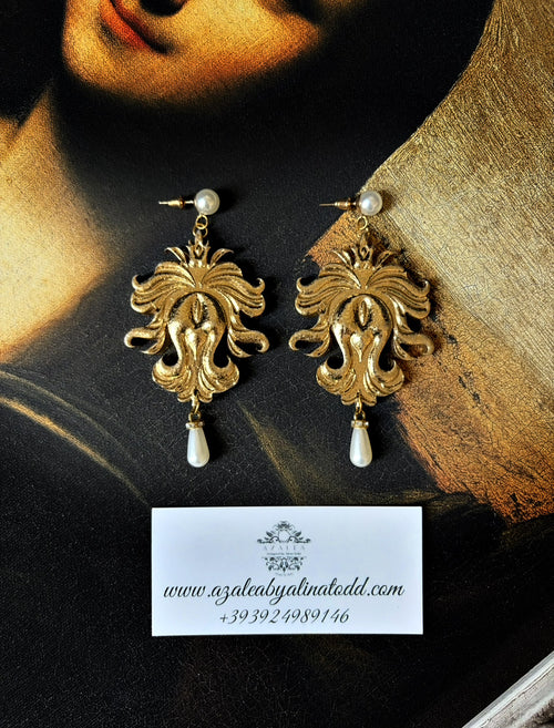 Classy earrings with 2 pearls